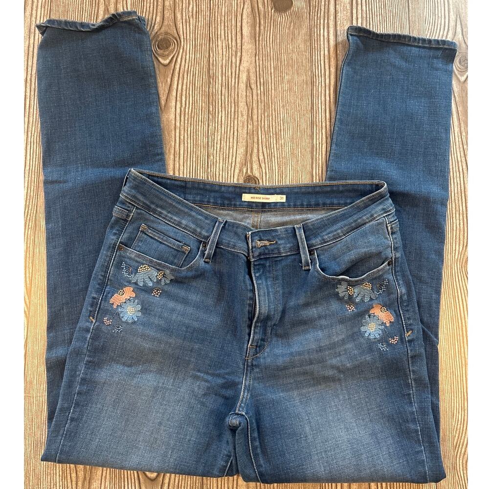 LEVI’S mid rise skinny denim embroidered flower jeans Women’s size 31